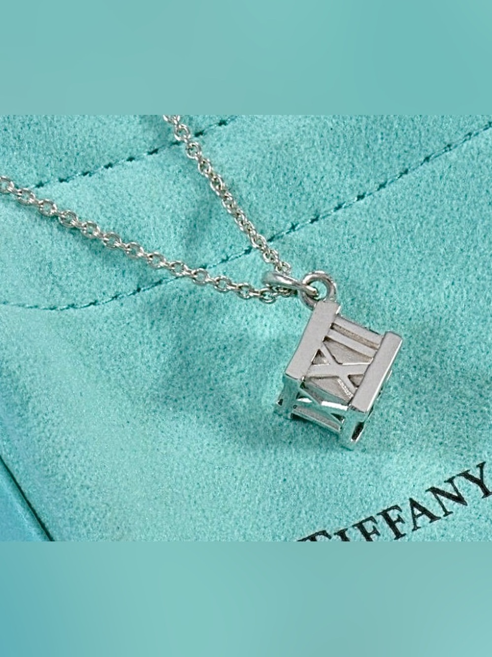 Tiffany & Co. 925 Sterling Silver 3D Atlas Cube Roman Numeral Pendant Necklace